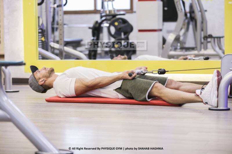 آموزش حرکت جلو بازو کابل خوابیده